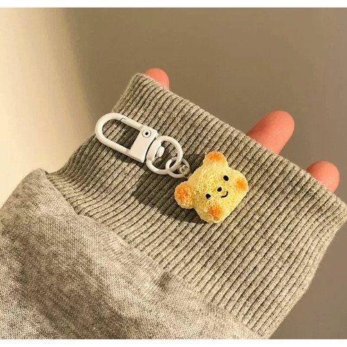 Брелок Esterum Собачка желтый 145₽